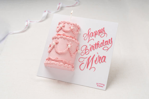 Yummy Bakes Frame Cake, a half cake mounted on a white board with a hand piped birthday message