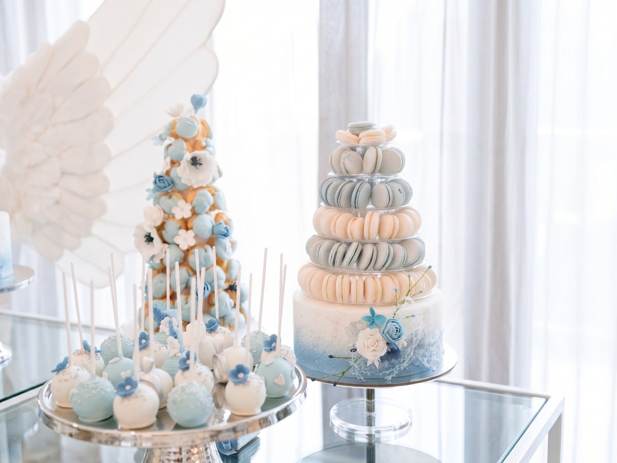 Yummy Bakes macaron tower on a dessert table