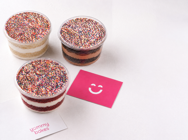 Yummy Bakes Dot Cake: vanilla, chocolate and red velvet cups topped with rainbow sprinkles